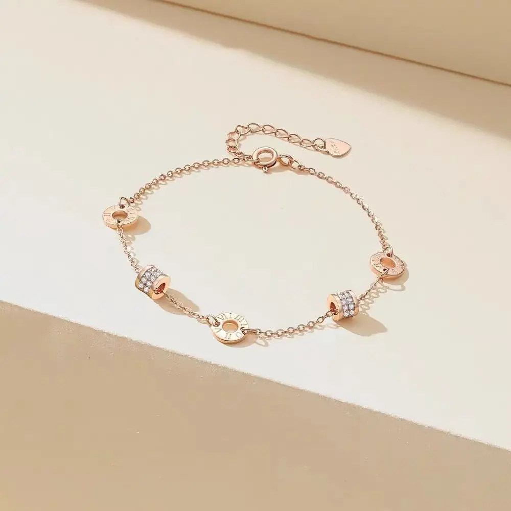 Rose Gold Tone Bracelet for Women, Minimalist Dainty Chain with Roman Numeral Engraved Disc, Crystal Pavé Embellished Interlocking Circles, Adjustable Jewelry, Gold Aesthetic, Avoid Direct Contact With Perfumes, Embellished Metallic Bracelets & Bangles, C