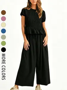 Women's Fashion High-End Textured Cotton Ruffled Short Sleeve Two-Piece Set, with waist-cinching ruffles and a flowing wide-leg pant design, perfect for summer, vacations, indoor, and outdoor wear
