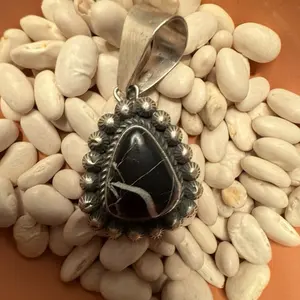 White buffalo pendant