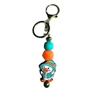 Teal and Orange Duckie Keychain with Golden Metal Clip