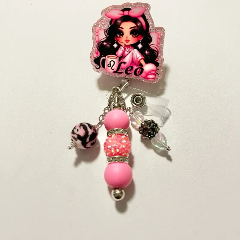 Leo Charmed- Cute trendy retractable badge reel with alligator clip and colorful beads. Charms may vary from photo but will match colors in acrylic piece.
