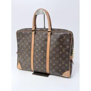 Pre-owned Louis Vuitton coated canvas Luggage Monogram Porte Documents Voyage JF13LV