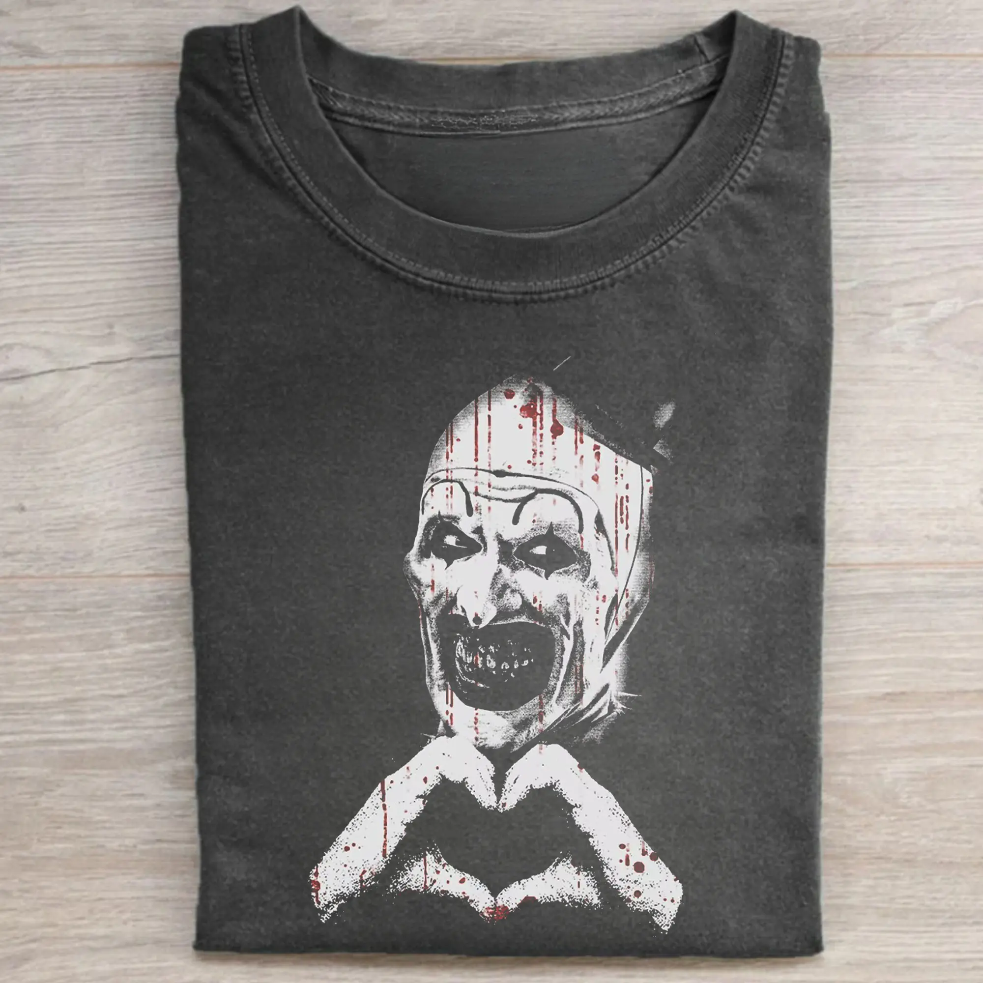 Vintage Art the Clown with Heart Hand Graphic Tee - Terrifier Movie Shirt - Horror Characters Tee - Iconic Villains From Horror Films - Damien Leone's Terrifier Movie - Halloween Shirt - Spooky Season - Trick or Treat - Fall Season - All Seasons