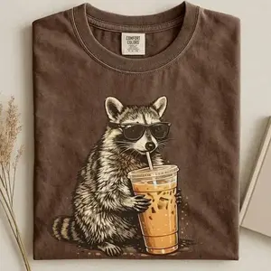 Comfort Colors Raccoon Iced Coffee Shirt, Funny Animal Graphic Tee, Comfort Colors Graphic Tee, Casual Outfit, Vintage Wash Shirt, Oversized Women’s Outfit, Apr 8