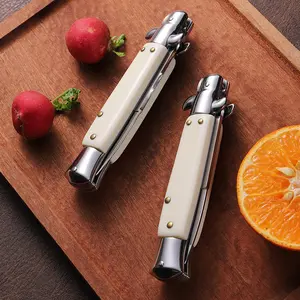 Multifunctional camping knife with off-white handle, mirror-polished blade and metal parts, suitable for camping and home use, such as cutting fruit and peeling.
