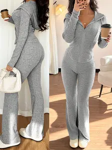 Women’s casual two-piece set featuring a hooded zip-up jacket with pockets and ribbed flared pants, suitable for various casual occasions.