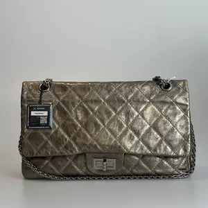 Pre-owned CHANEL Crinkled Calfskin Shoulder Bag 2.55 Reissue Medium Metallic Gold Quilted Bag With Silver tone Clasp 45740107