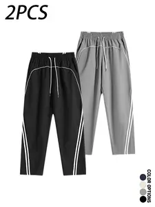 Multi-pack men’s casual long pants featuring a deconstructed color-block striped patchwork design, drawstring elastic waistband, loose fit—versatile for everyday wear, leisure, sports, and fitness.