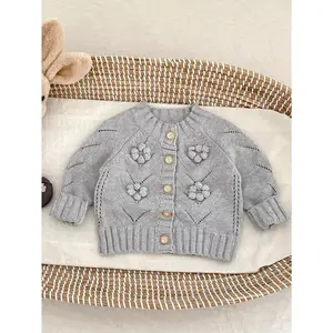 New autumn collection for girls aged 0-3 years, featuring a hand-knitted, hollow-out ball-patterned sweater jacket, paired with a casual and versatile cardigan