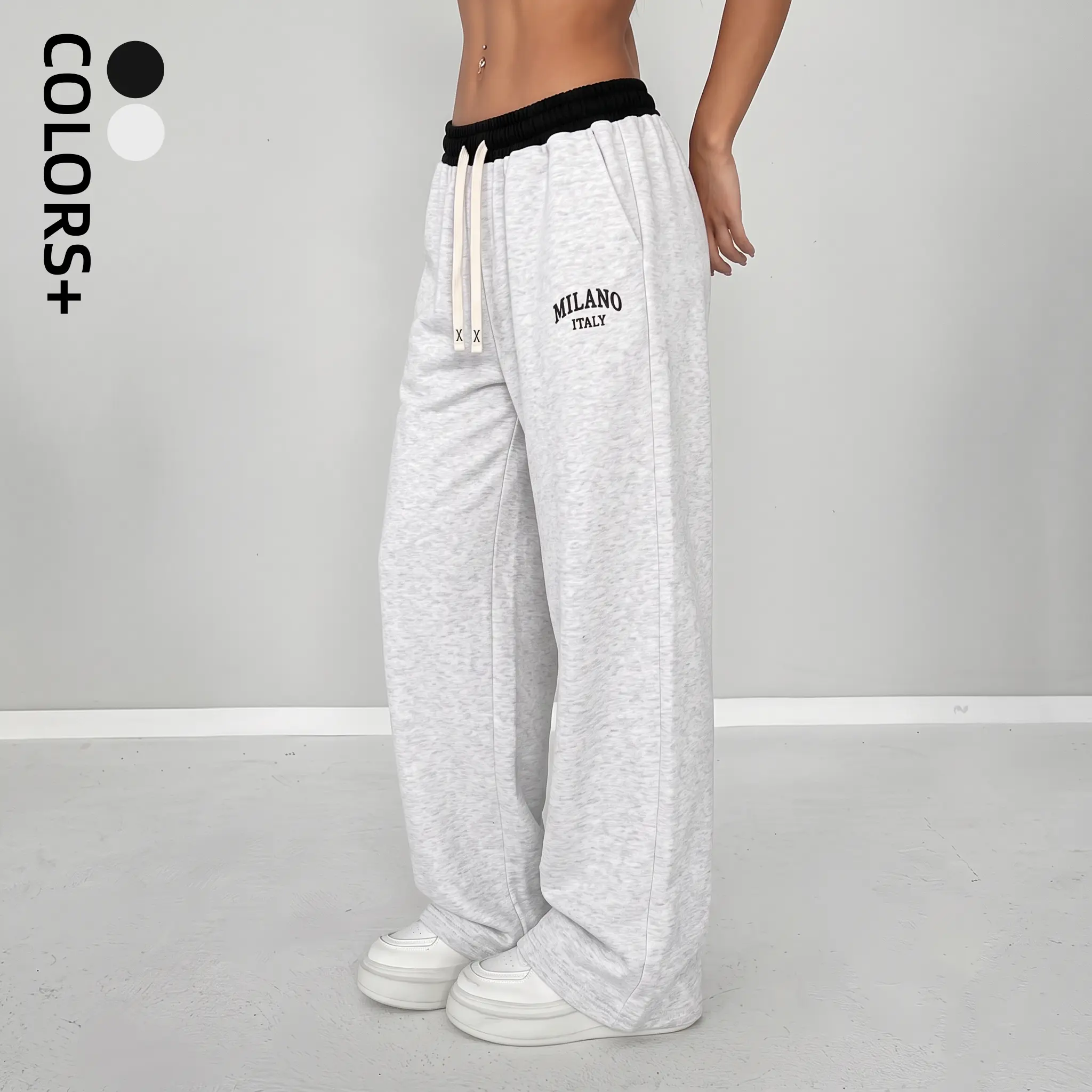 Milan, Italy sweatpants — gray, loose fit with drawstring waist and pockets; comfortable and stylish for everyday wear, American hot‑girl style.