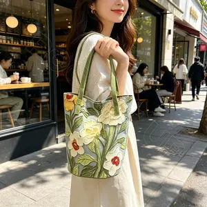New oil painting flower niche high-end shoulder bag versatile niche large capacity handheld commuting bucket bag