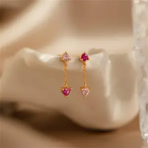This stylish two-piece brass earring set, inlaid with zircon and adorned with trendy tassels, is suitable for both men and women and is an ideal choice for everyday wear, parties, weddings, and holiday gifts.