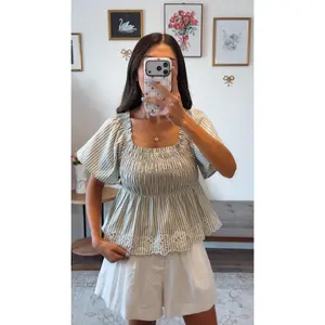 Sage stipe peplum top