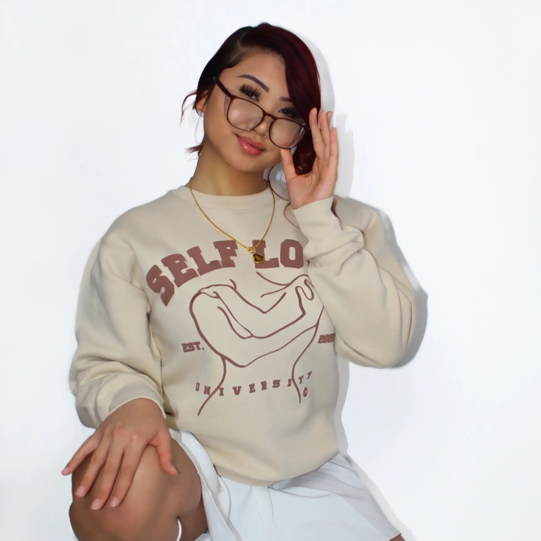 CREME CREWNECK