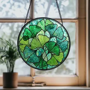 A four-leaf clover-shaped stained glass window hanger, a gift for nature lovers. For those who appreciate simplicity.