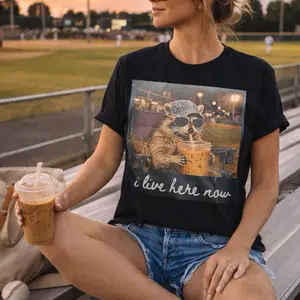 I Live Here Now Baseball Mom Tee - Black T-Shirt with Raccoon Design, Short Sleeve, Casual Style, Perfect for Baseball Fans