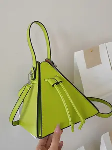 Fashionable, personalized, and unique geometric design bag, with intricate decorative details and drawstring design. It is a versatile and compact carry on crossbody bag, suitable for socializing, parties, and photography