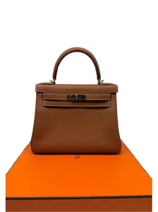 Pre-owned HERMÈS leather Shoulder Bags Hermes Kelly 28 Retourne handbag in gold Togo leather