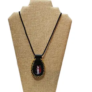 Amuleto de la Santa Muerte Pendant Necklace with Black Cord and Gold Trim for Spiritual Protection