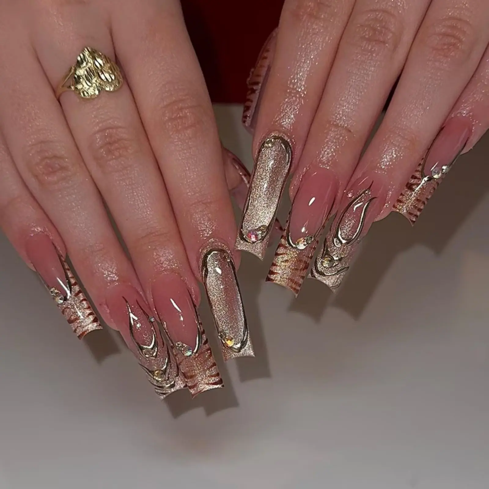 Luxury Rose Gold Chrome Press-On Nails | Long Coffin Nude French Tips with 3D Metallic Swirl & Rhinestone Design | Handmade Glossy False Nails
