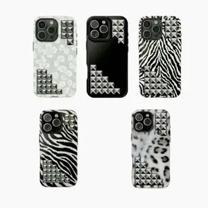 The phone case has a snow leopard print theme with 11-17 rhinestones