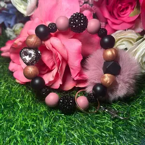 Intentionally mauve wristlet  keychain color scheme black, mauve, golden and bling beads made with wire