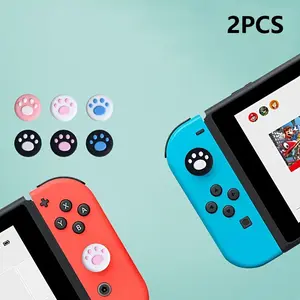 2pcs Cute Cat Claw Design Thumb Grip Caps Thumb Grips Analog Stick Cover Joystick Cap Soft Silicone Cover Compatible with Nintendo Switch, Switch Lite and Joy Con Controller