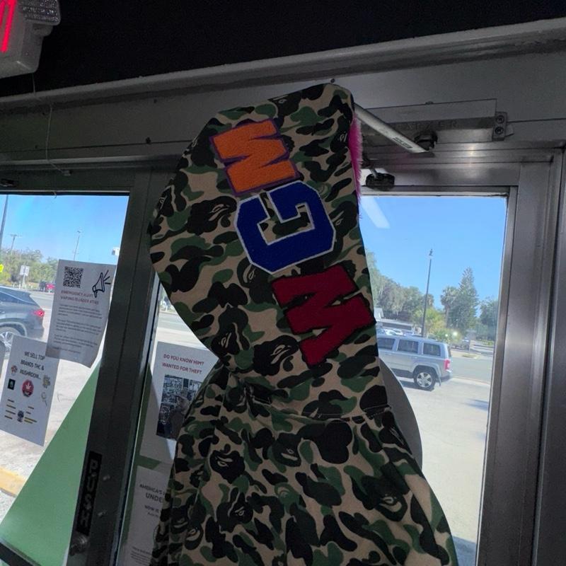 A Bathing Ape Camo Jacket with Orange Logo and Hoodie Design for Men