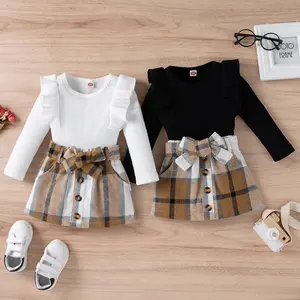 Toddler Kids Girls 2 Pieces Outfit, Long Sleeve Knitted Ribbed Solid Color Tops + Bowknot Buttons Plaid Mini Skirt Set
