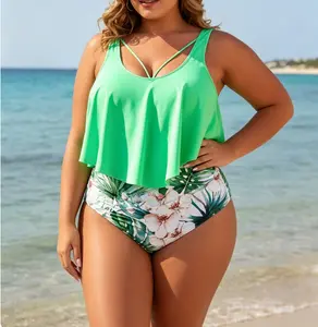 Plus Size Green Flowy Tankini & Tropical High-Waist Bottom Set Solid green flounce tankini top with strappy detail, paired with a high-waisted tropical floral print bottom. Tummy control, modest and stylish two-piece swimwear Summer Vibes