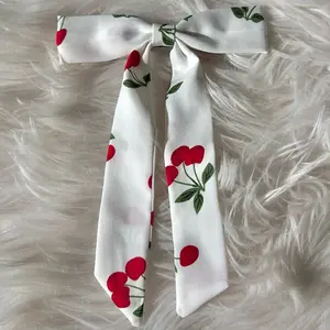 White cherry bow clip small