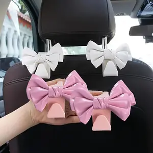 [Stylish Car Seat Hooks] 2pcs Stylish Bow Car Seat Hooks - PU Leather Backseat Storage & Decoration, Fit for All Vehicles, White & Pink Bows for Organized and Chic Interior Accessories, Car Seat Accessories