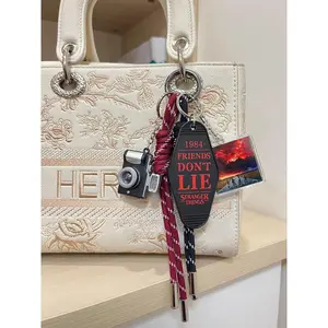 Stranger Things Series CD Case Keychains and Backpack Decorations Camera NFC Fan Badge Pendant Trendy Bag Pendant Charms Decorative Ornaments for Women & Men Perfect for Backpacks and Stranger Things Items