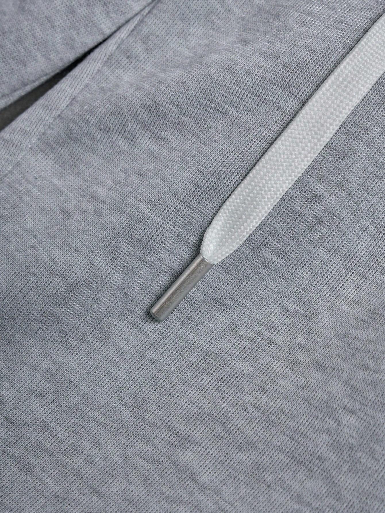 Gray sweatpants with embroidered logo, Y2K American street casual joggers, loose casual knitted sports pants featuring a drawstring and faux two-piece design with contrasting double waistband, perfect for everyday wear and trendy gatherings.