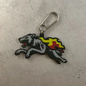 FIRE HOUND Keychain with Vibrant Flames Design and Durable Metal Clip for Easy Attachment United States Zombies Theme Accessory