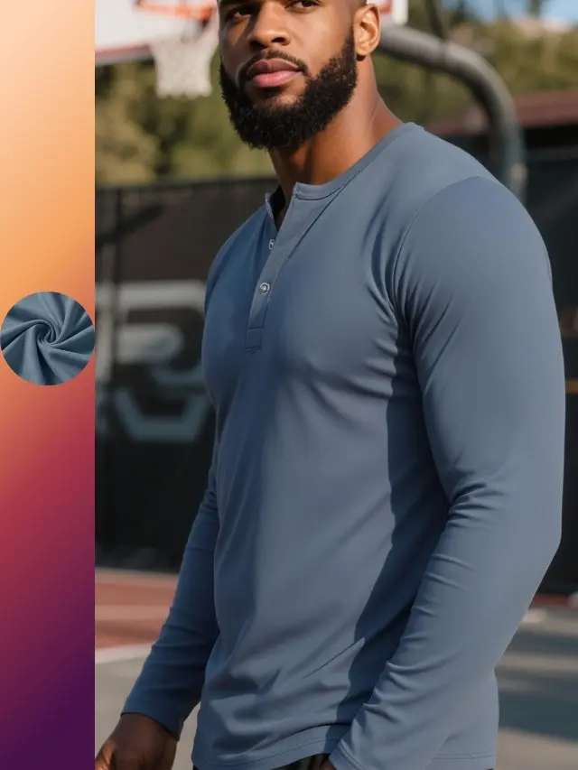 Men’s Henry-collar long-sleeve casual T-shirt with a three-button half placket closure, topstitching at the collar, reinforced sleeve cuffs with bartacking, and a curved rounded hem design. A slim-fit, slightly relaxed long-sleeve base layer in a solid co