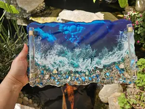 Handcrafted Art Hand Poured Epoxy Resin perfume and jewelry storage display tray with crushed crystal quartz, metal and glass 14"X8" with acrylic glass look handles and brass accent. Ocean and wave theme décor for home or office.