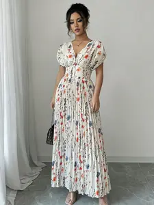 A fashionable white background pleated skirt with colorful floral prints for women. The colorful floral prints make it lively, and the pleated skirt is elegant and suitable for commuting to work, shopping, and outdoor wear