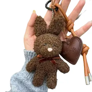Mini bunny bag accessory - an adorable keychain designed for girls and teens, featuring a heart-shaped pendant and bow details. Its delicate design makes it perfect for everyday use and also makes a wonderful Valentine's Day gift.