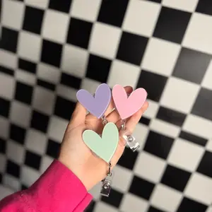 Heart Badge Reels - Adorable Heart-Shaped Keychains in Pastel Colors for Stylish Accessory