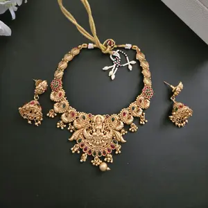 Temple Brass Necklace and Earrings Set with Intricate Design and Red Gemstones