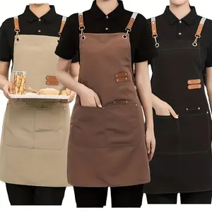 Multi purpose waterproof multi pocket apron with adjustable shoulder strap design, perfect for coffee shops, restaurants, fashion, gardening, nail art, hairdressing, salon art, and cleaning workwear. Durable coffee shop apron