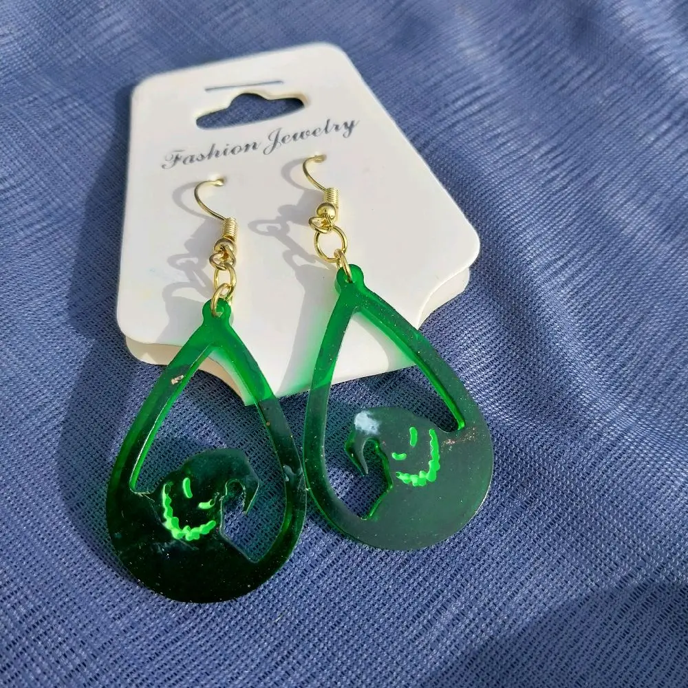 Oogie Boogie Dangle Earrings with Green Color and Circular Design, Featuring a Green Pendant and Gold Accents