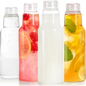 4 Pack Glass Milk Bottle, 34 Oz  Juice Drinking Jar with Airtight Lid, Heavy Duty Leakproof Water Bottles Container for Iced , Beverage, Smoothies Storage
