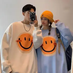 Couple's sweatshirts with orange smiley faces, sweatshirts for couples, trendy sweatshirts Cotton Crewneck