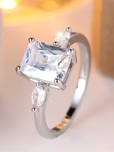 A rectangular ring made of white zirconia is fashionable, elegant and simple, suitable for women to wear at travel wedding parties