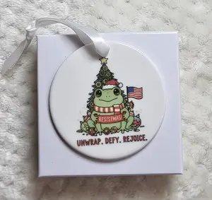 Unwrap Defy Rejoice Resistmas Political Frog Ceramic Christmas Ornament with Festive Design and American Flag Accents for Holiday Decor