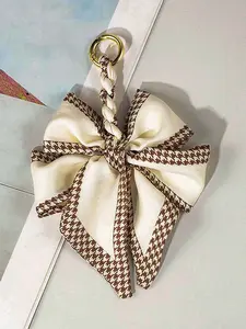 Niche retro elegant houndstooth border bow keychain, personalized creative shape, hand-woven rope metal ring exquisite pendant, small and exquisite versatile fashion, shoulder crossbody bag small object pendant