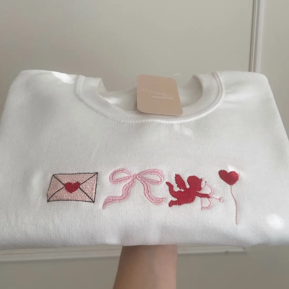 Valentine’s Day sweater,  Cupid sweater, love letter, gift idea for your bestie, gift idea for your sister, pink bow, embroidered pink bow, valentines day gifts, chic style,