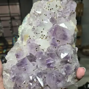 Large amethyst cluster with geothite inclusions